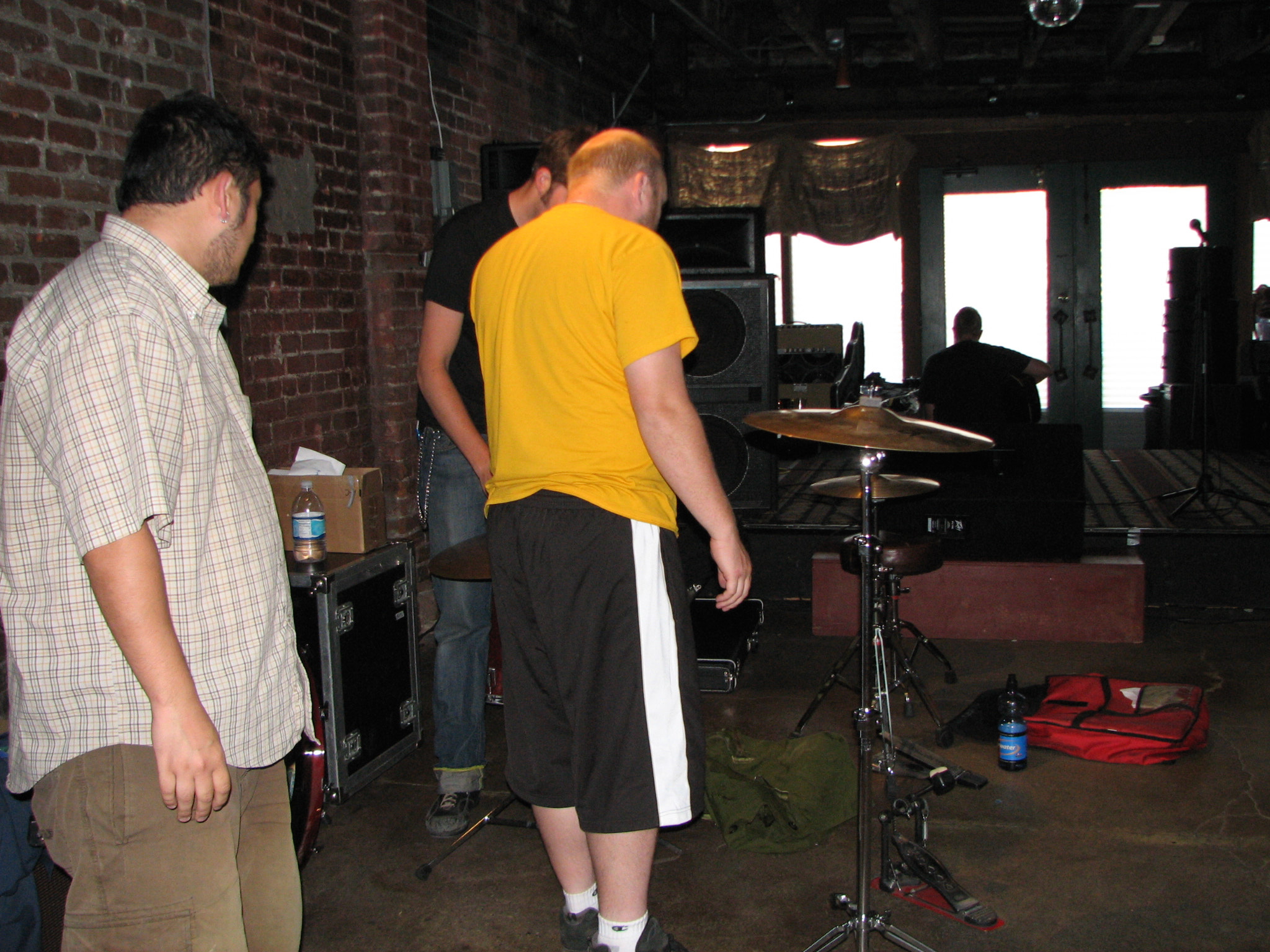 the band setting up to play in a bar in spokane