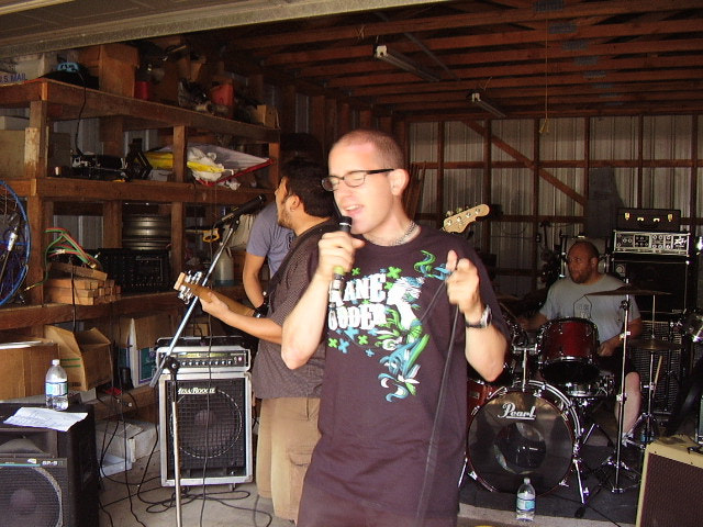 the band playing a show in a garage in the middle of oregon