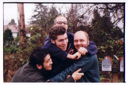 the band in a big bear hug during happy times