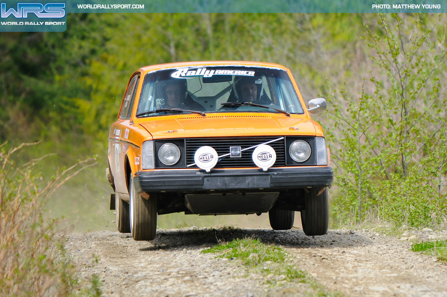 a big orange volvo does the littlest of jumps