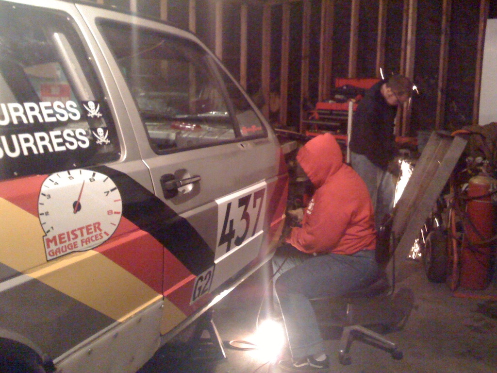 The family at work on the DemonRally car
